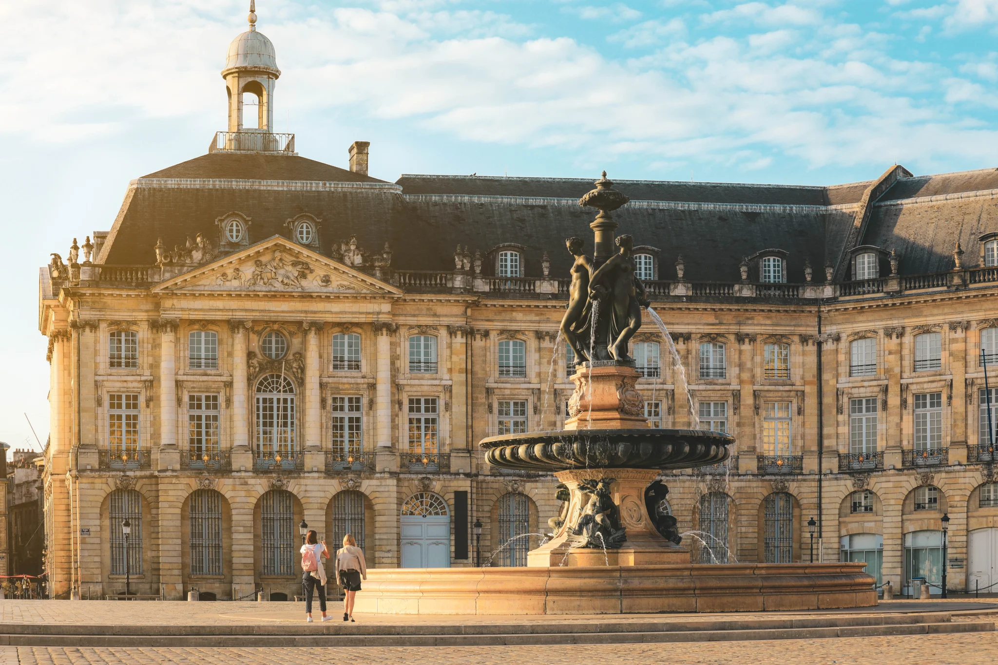 Place de la Bourse and the Water Mirror in Bordeaux at sunset